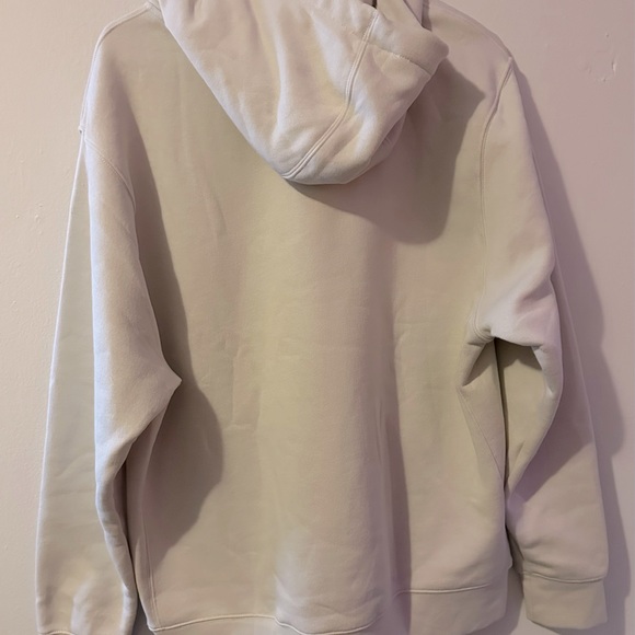 Brand New Large Nike Hoodie. (NWT)! Cream colored, with a black Nike swoosh. - Picture 6 of 8